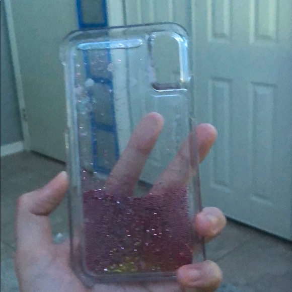 This is a iPhone XS clear glitter moving case - Picture 2 of 3